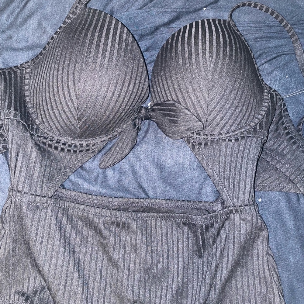 Stylish one-piece bathing suit with cut out in middle